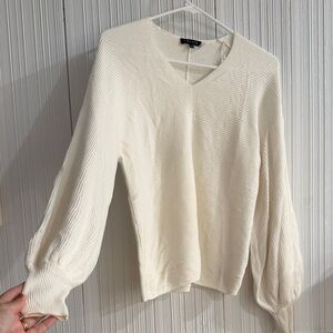 1. State Cream V-Neck Sweater